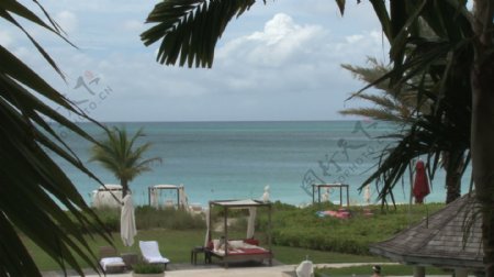 酒店度假小屋和海滨沙滩6股票视频录像的椅子