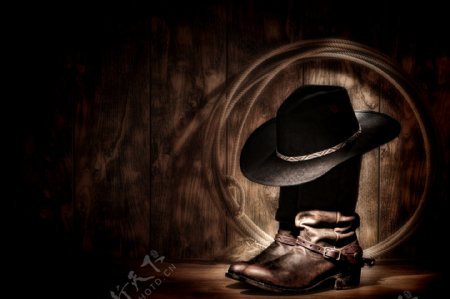 牛仔帽子与皮靴图片