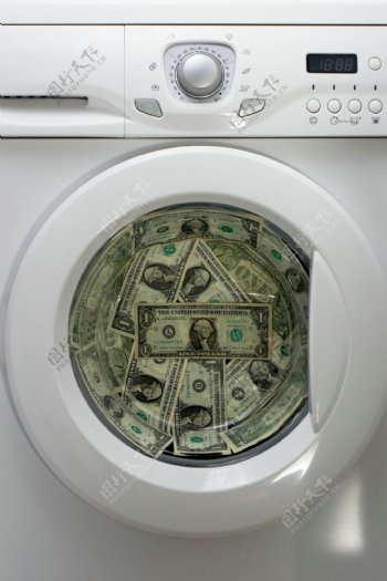 洗衣机与钱币图片