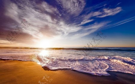 海边沙滩日出蓝天