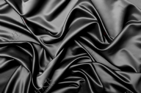 黑色丝绸质感布料背景图