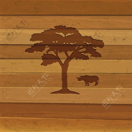 在木制背景犀牛和树的剪影