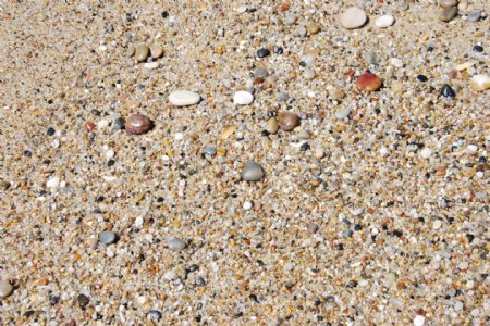 摘要背景与丰富多彩的石头在沙滩上