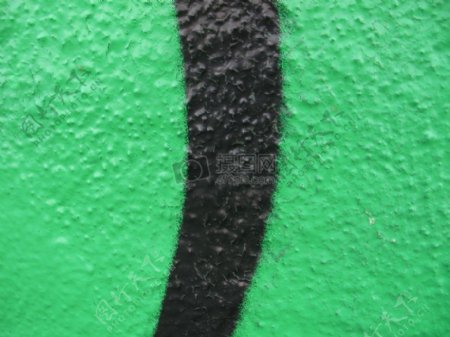 绿色墙壁上的黑色线条