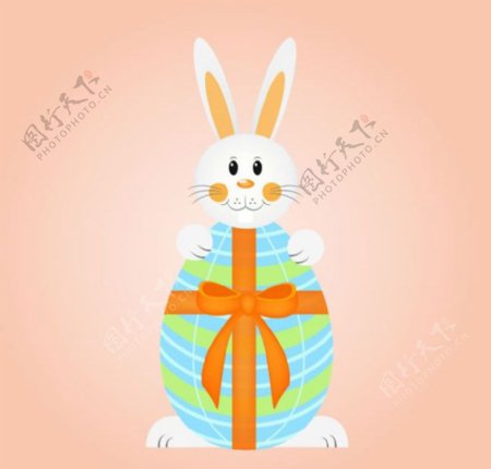 卡通抱彩蛋的兔子矢量素材下载