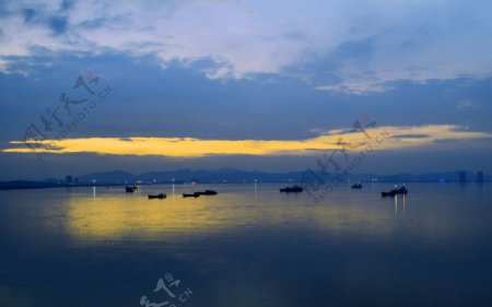 日落大海渔船风景
