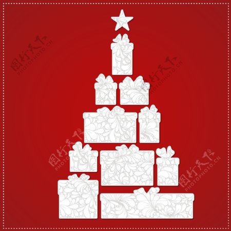 圣诞树由礼品盒和红色蝴蝶结制成